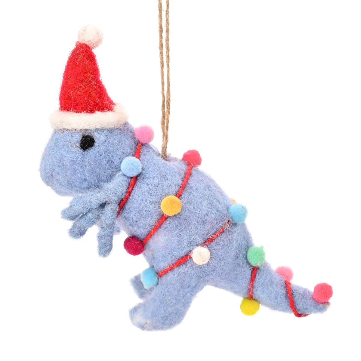 Decorative elephant ornament with a Santa hat and colorful pom-poms on a white background