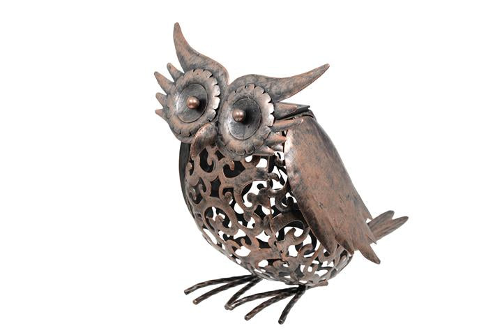 Decorative metal owl sculpture on a white background