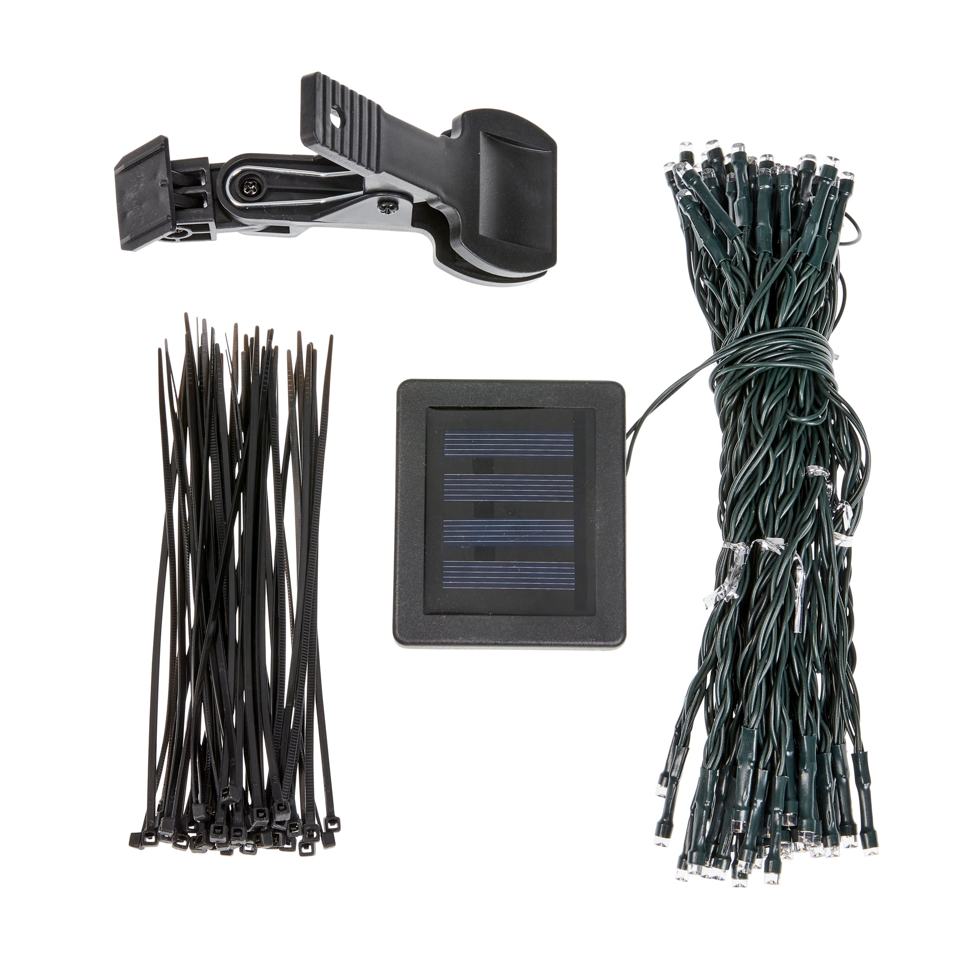 Solar light kit with solar panel, cable ties, and LED lights on a white background
