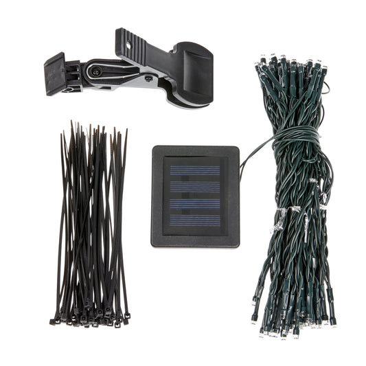 Solar light kit with solar panel, cable ties, and LED lights on a white background
