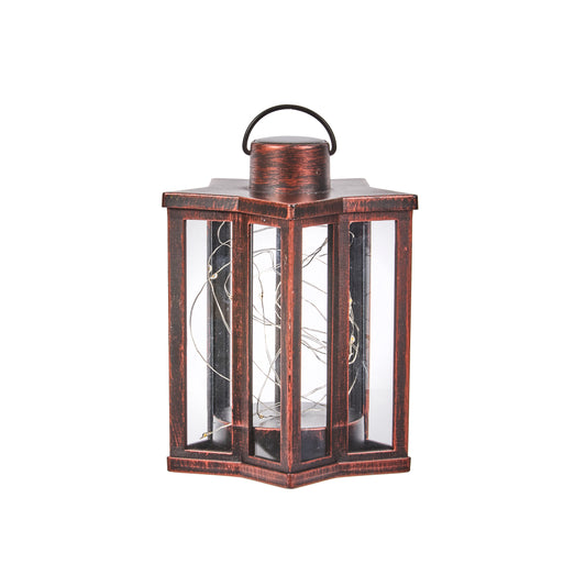 Decorative lantern with a copper finish on a white background