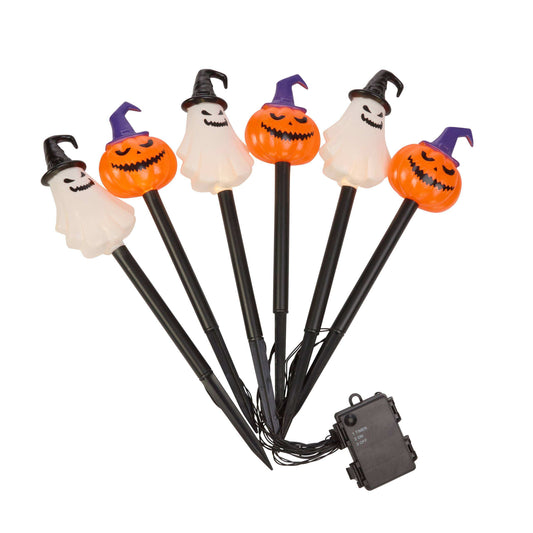 A set of six Halloween yard lights with black stake poles, featuring four orange jack-o'-lantern tops with purple witch hats and two white ghost tops with black witch hats, shown with a black wired controller on a white background.