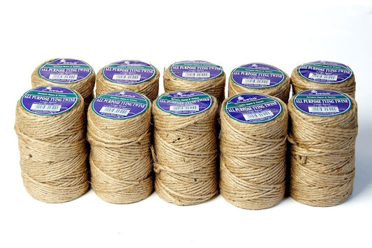 Multiple spools of twine with labels on a white background