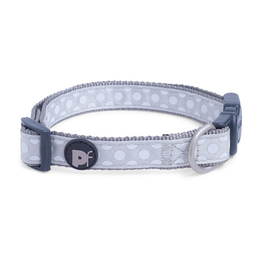 Dog collar with polka dot pattern and brand logo on a white background