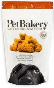 Pet Bakery Tasty Chicken Mini Bones dog treat package with a black dog illustration on a white background
