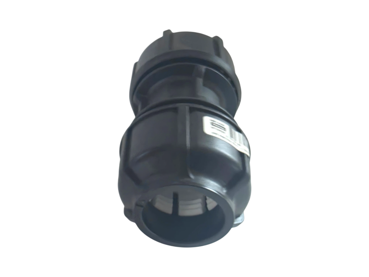 A black plastic pipe connector fitting with a white product label, shown against a plain white background.