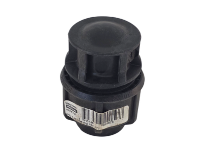 A black plastic cylindrical component, likely a plumbing or drainage valve fitting, featuring a barcode label on its side, set against a plain white background.