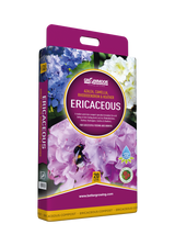 Gardening product packaging for Ericaceous plants with purple and white flowers on a white background.