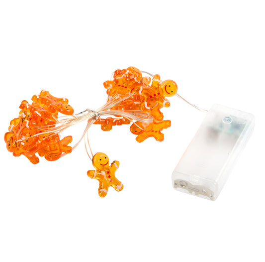 String lights with orange Gingerbread man-shaped bulbs and a clear battery pack on a white background