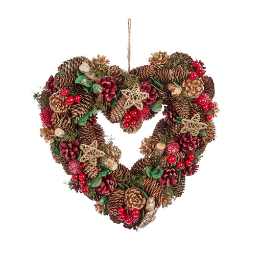 Heart-shaped wreath with pinecones, berries, and stars on a white background