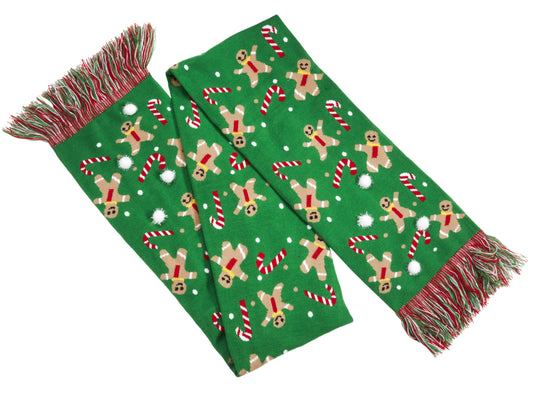 Green scarf with gingerbread man and candy cane pattern on a white background
