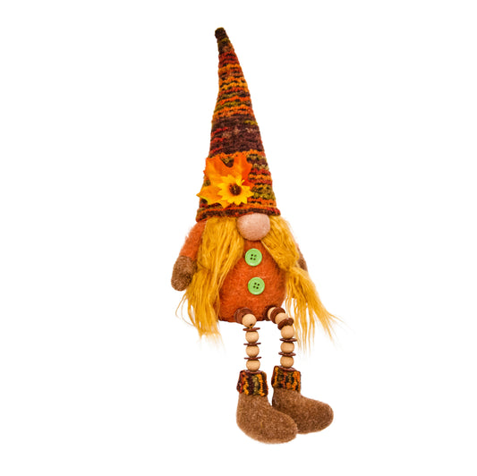 Decorative gnome with a colorful hat on a white background