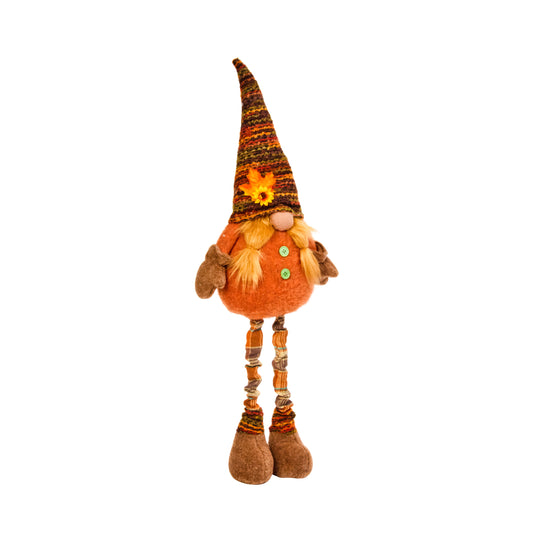 Decorative gnome with an orange hat and scarf on a white background