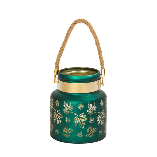 Green lantern with gold floral patterns and a rope handle on a white background