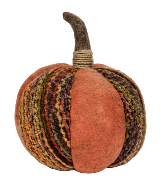 Decorative pumpkin with a textured surface on a white background