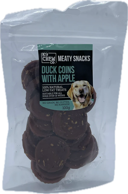 Package of K9 Chew Co meaty snacks with duck coins and apple, suitable for dogs.