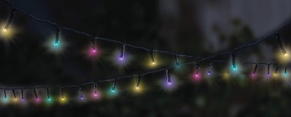 String of colorful lights against a dark background