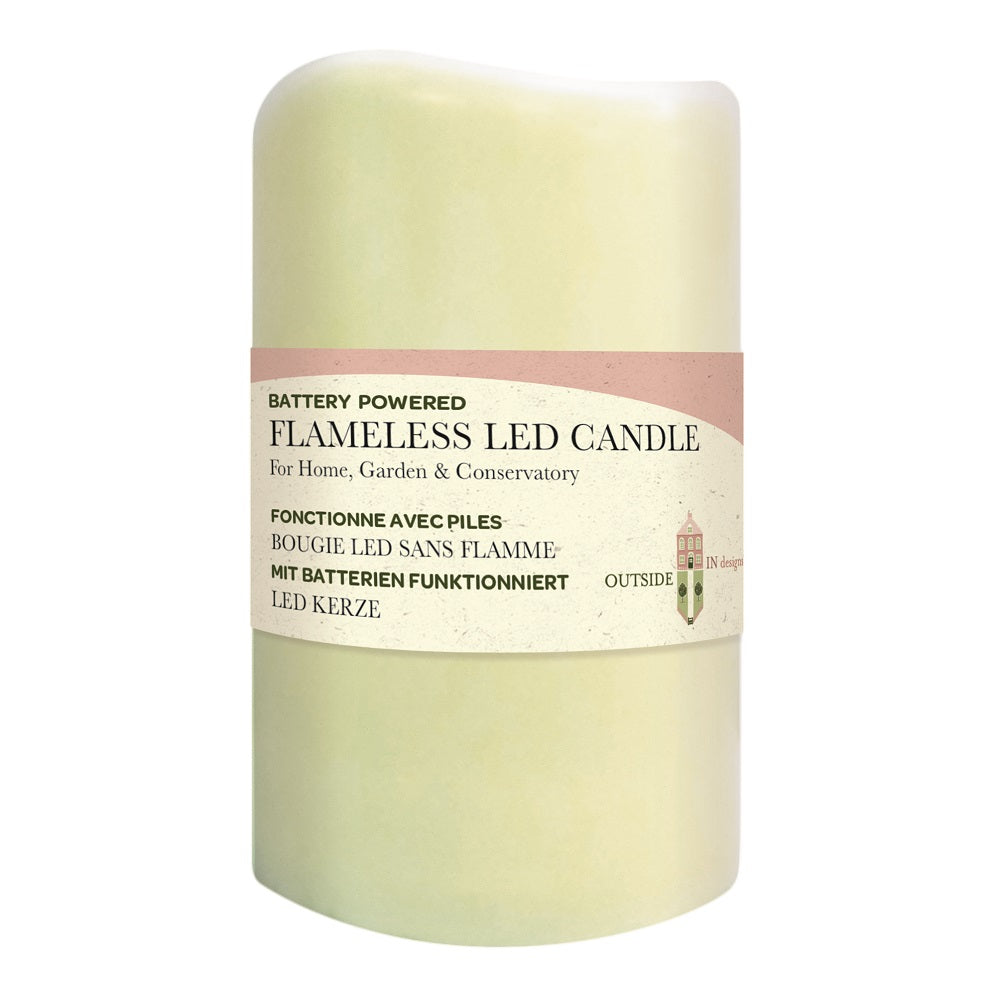 Battery-powered flameless LED candle with a label on a white background