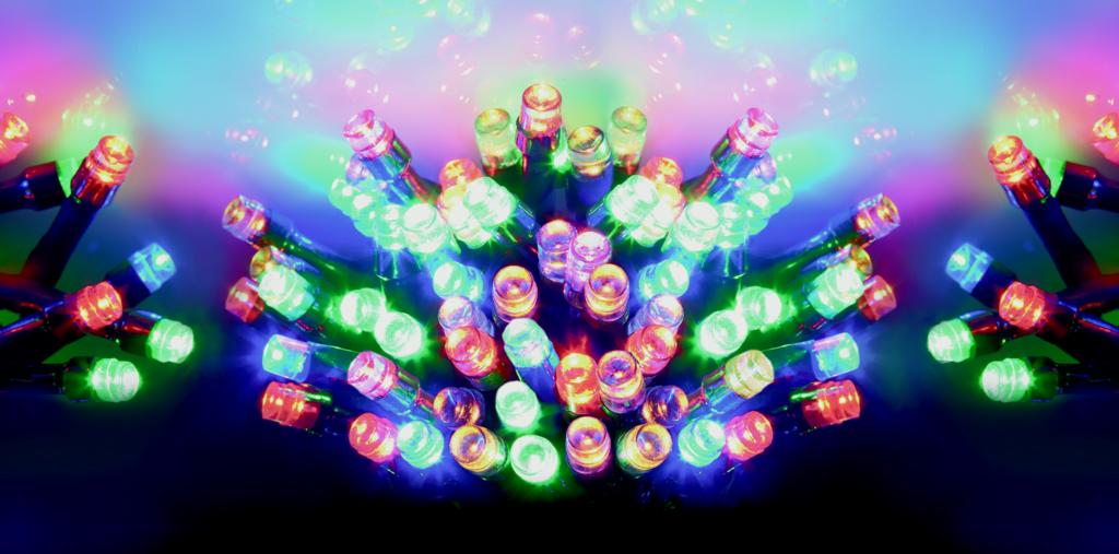 Multicolored string lights on a dark background