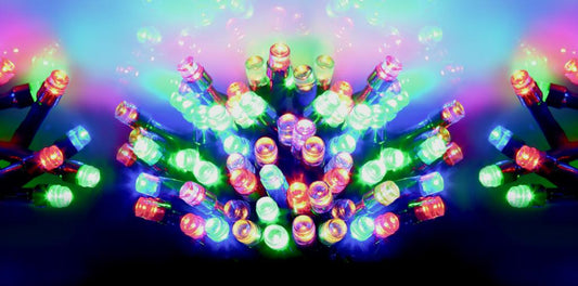 Multicolored string lights on a dark background