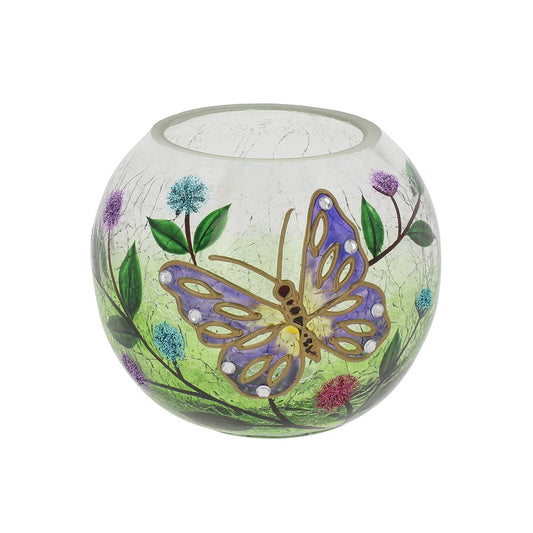 Candle holder with a butterfly pattern