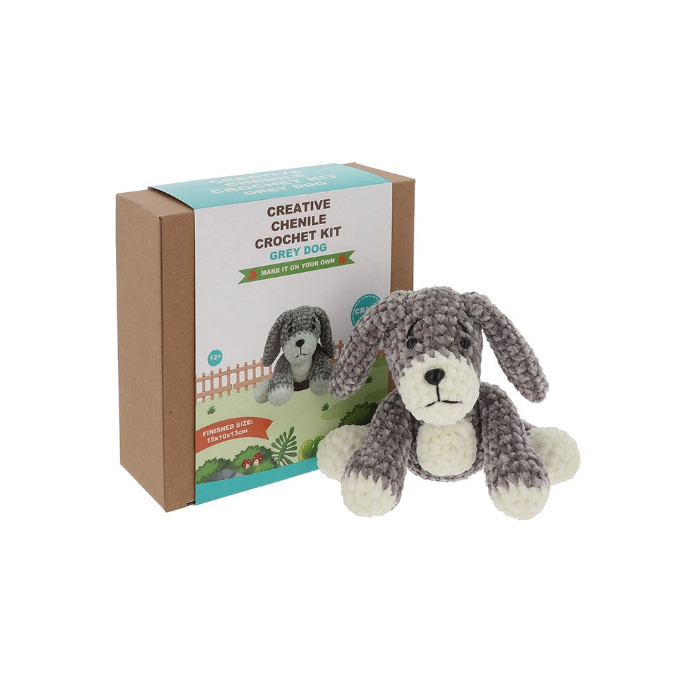 Crochet kit with a completed dog toy and packaging on a white background
