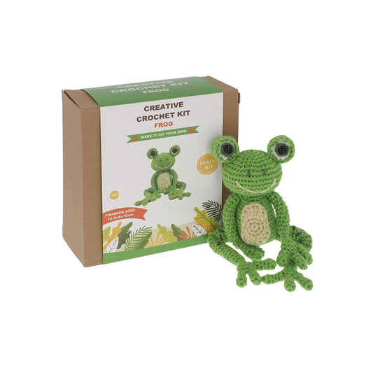 Crochet frog next to a box