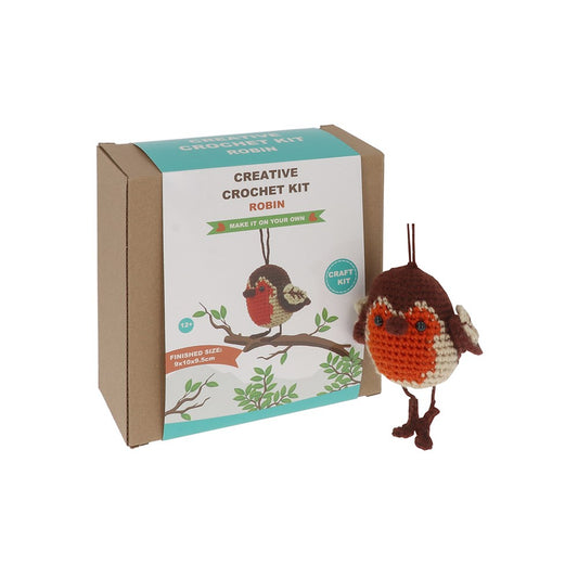 Crochet kit for making a robin with packaging on a white background