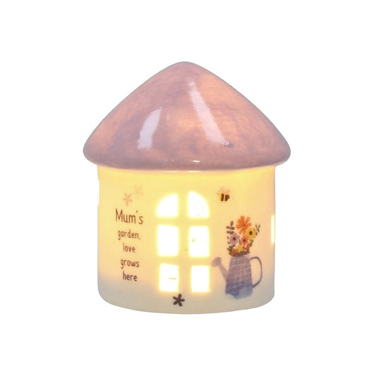 Ceramic night light with 'Mum's garden, love grows here' text and floral design on a white background