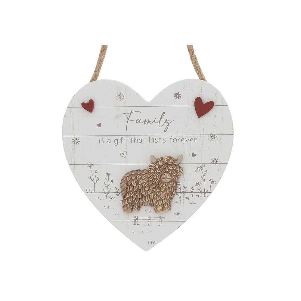 Highland cow family plaque on a white background
