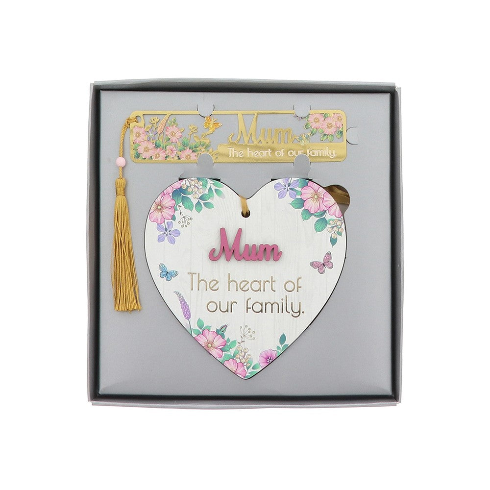 Heart-shaped decorative item with floral design and 'Mum, The heart of our family' text in a box.