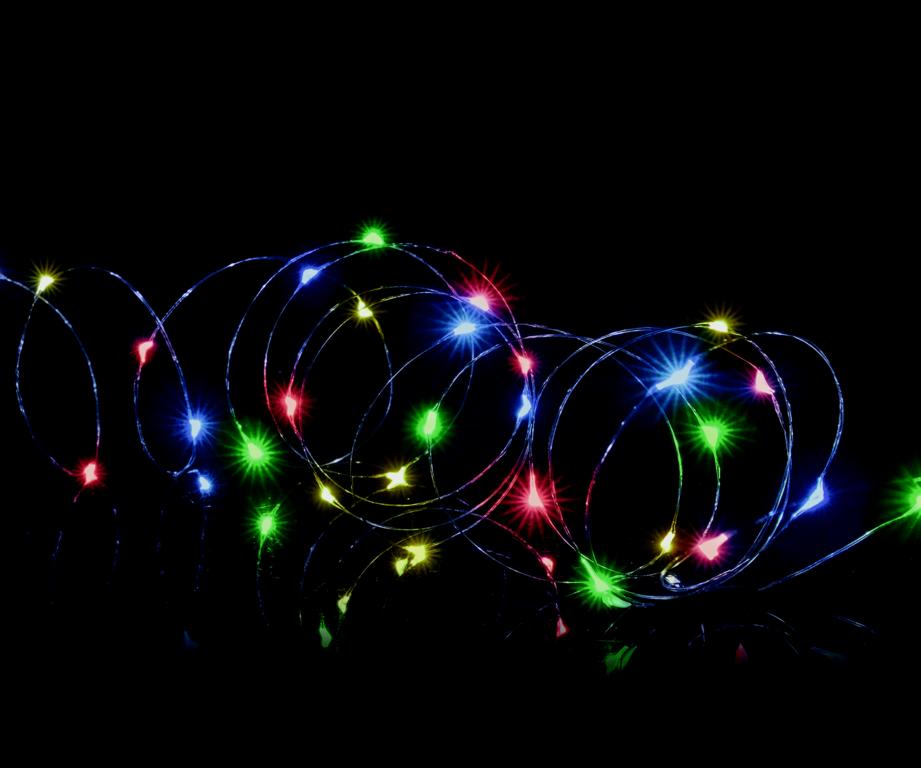 Colorful string lights on a black background