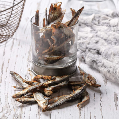 Hollings Sprats in a glass on a table