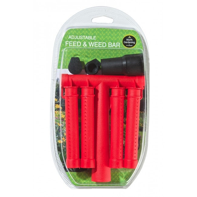 Packaged adjustable feed and weed bar with red nozzles and black connectors on a white background.