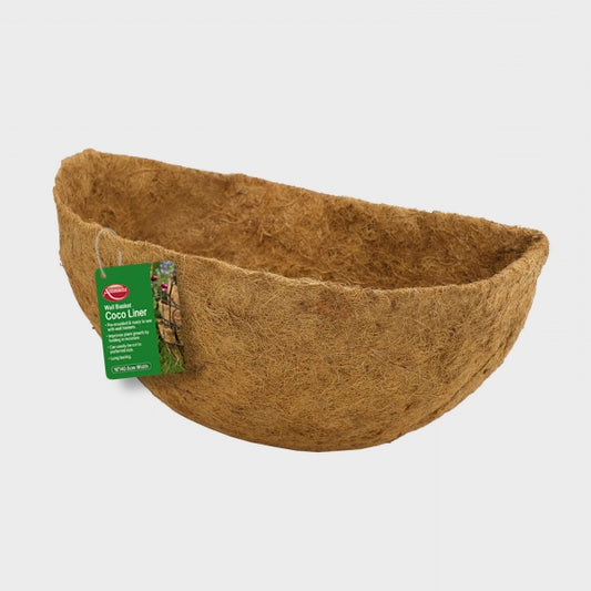 Coco liner pot with a green label on a light gray background