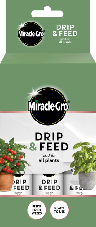 Miracle-Gro Drip & Feed packaging for plant food on a green background