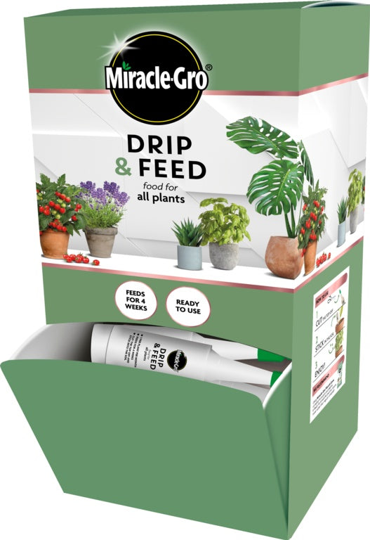 Miracle-Gro drip and feed plant food packaging with plants on a white background