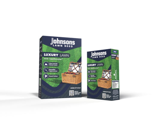 Two boxes of Johnsons Luxury Lawn Seed on a white background