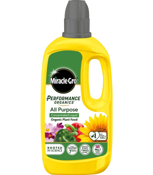 Yellow bottle of Miracle-Gro Performance Organics All Purpose plant food on a white background