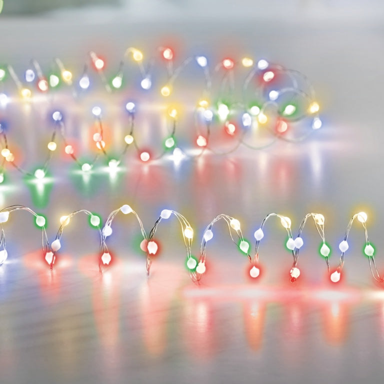 String lights with multicolor bulbs on a neutral background