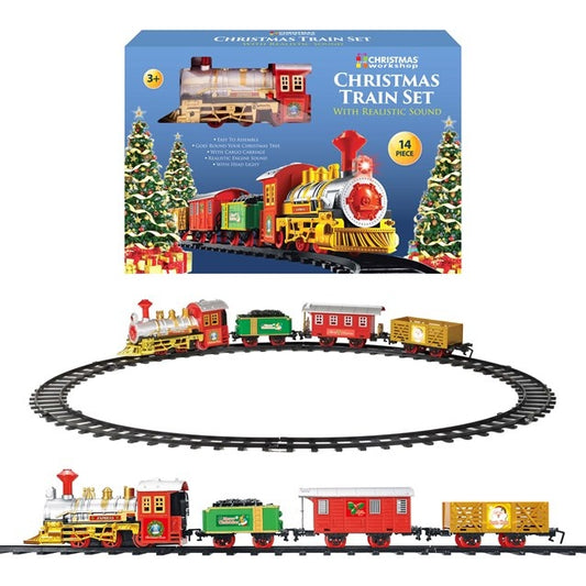 Christmas train set with track and colorful train cars in front of its packaging.