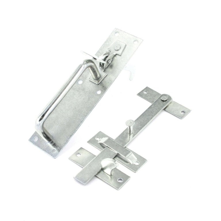 Metal door handle and latch set on a white background