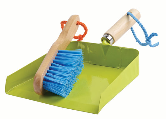 Green dustpan with blue brush and wooden handle on a white background