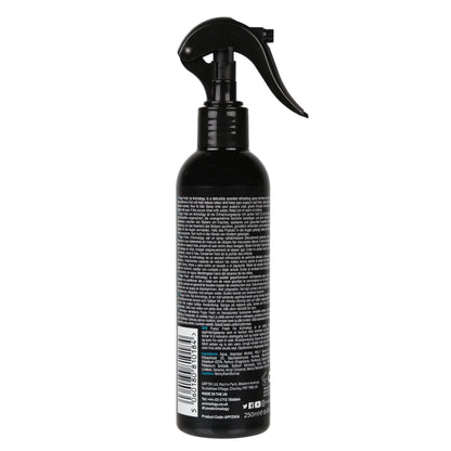 Black spray bottle with a label on a white background