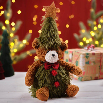 Christmas Teddy Bear Tree Topper Figure | Plush bear wearing a green faux-fur tree costume with a red bow and a gold star on top | UK seasonal decoration