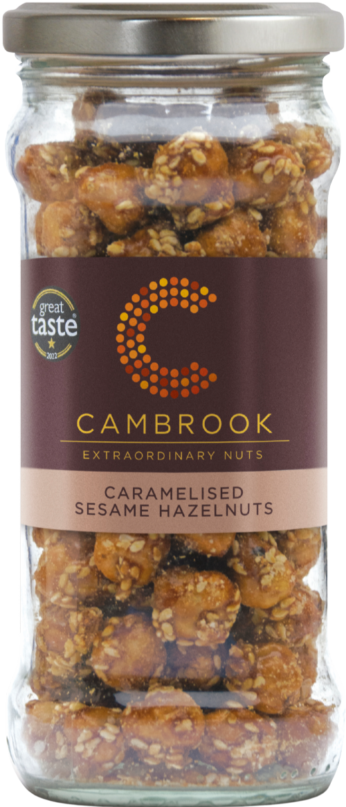Jar of Cambrook caramelised sesame hazelnuts with a visible brand label.