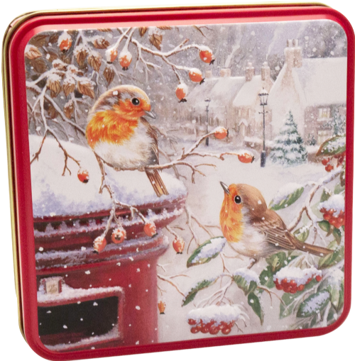 Square red Christmas tin with an illustration of two robins sitting on snowy rosehip branches beside a classic red pillar box in a wintry village scene.