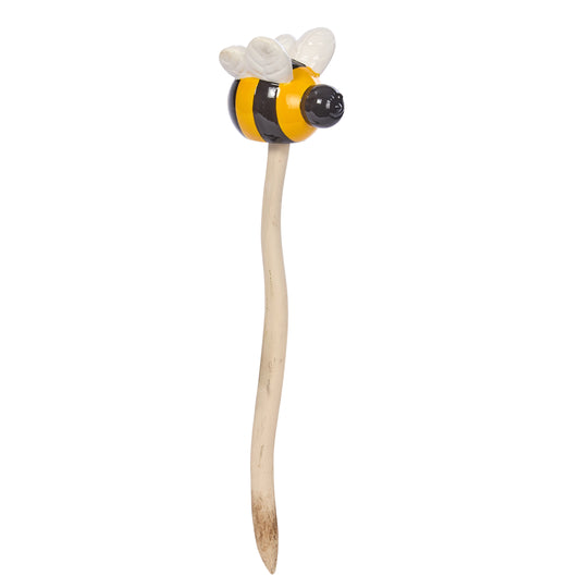 Plant stake shaped like a bee on a white background