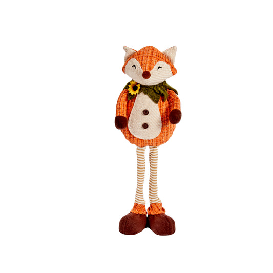 Stuffed fox toy with a sunflower on a white background