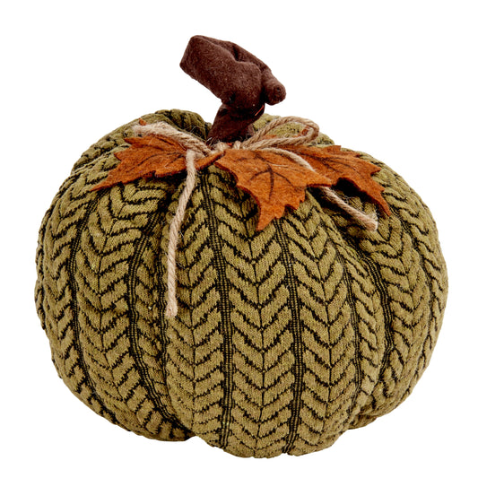 Decorative pumpkin with a textured pattern and brown leaf on a white background
